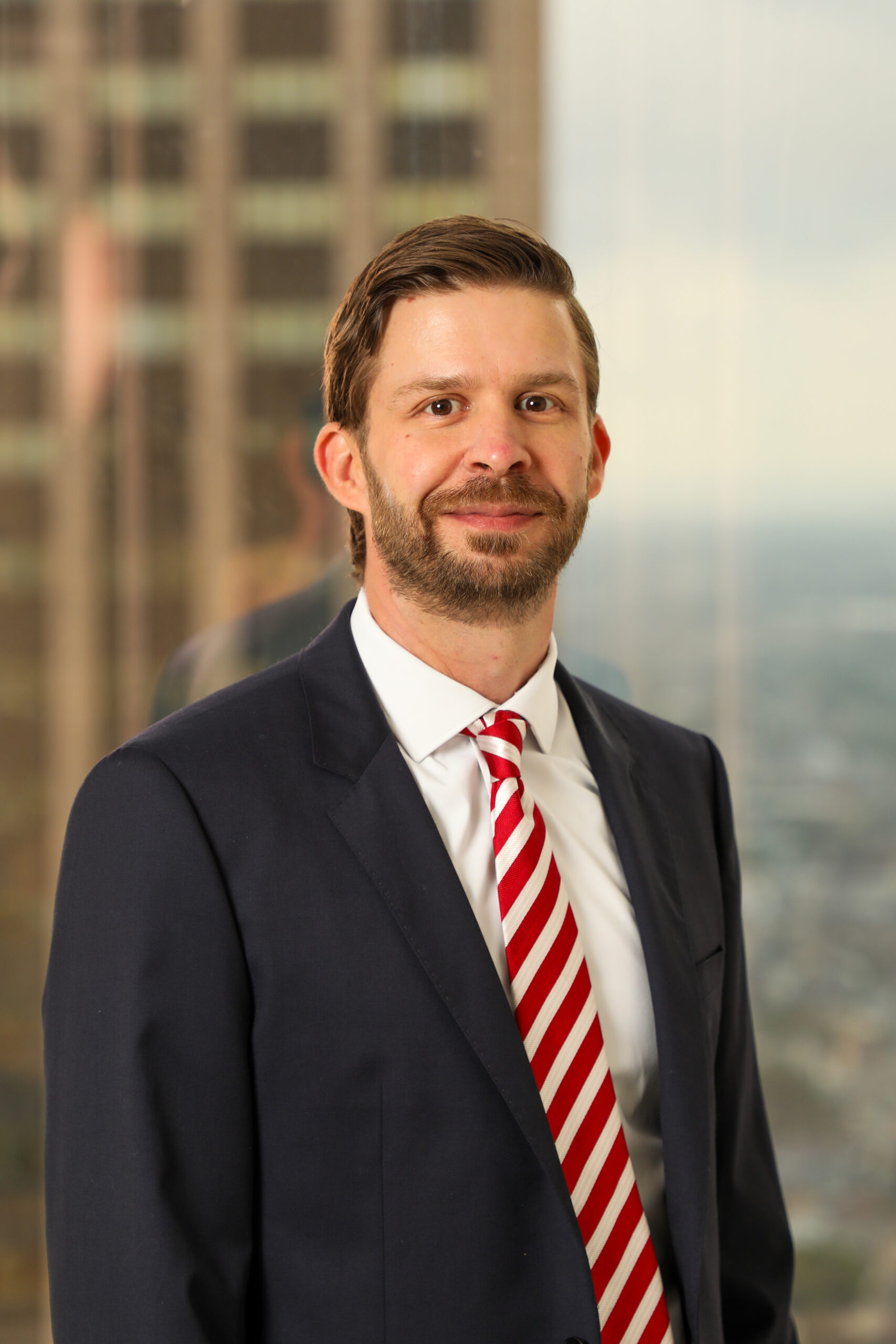 Portrait of Attorney Seth Kerr, insurance lawyer specializing in property damage claims.