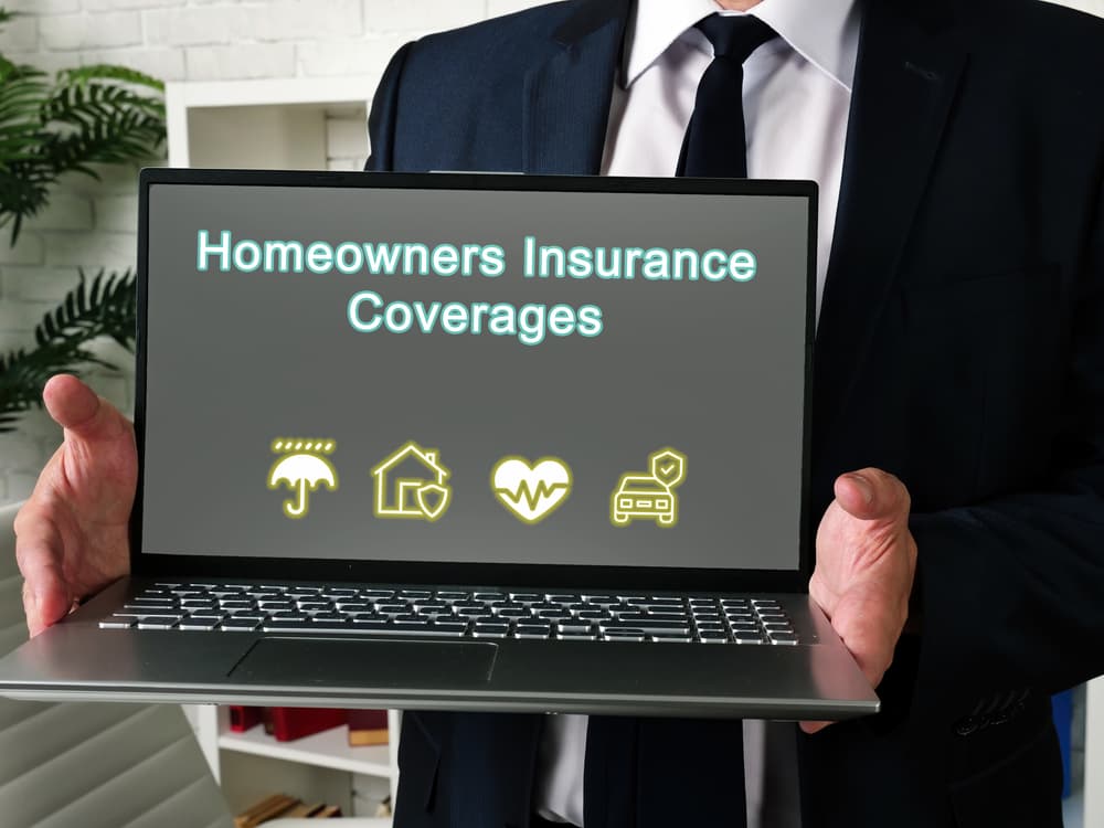 A business concept focused on explaining homeowners insurance coverages, highlighted with a sign or label on a document for easy reference.






