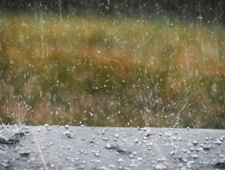 Property damage in a severe hailstorm, requiring hail damage lawyer for claims